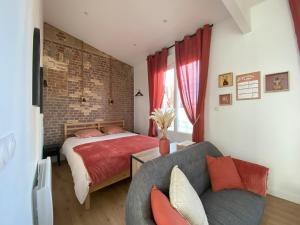 Postel nebo postele na pokoji v ubytování La Fabrique - Vue mer - Stationnement gratuit