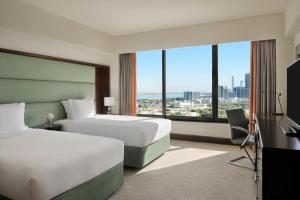 Postel nebo postele na pokoji v ubytování InterContinental Abu Dhabi by IHG
