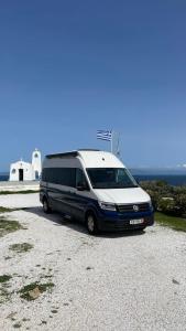 a van parked on the side of a road at Reunion in Greece Campervan in Drafí