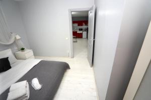 Postel nebo postele na pokoji v ubytování Arkem Maltepe