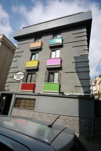 a building with colorful balconies on the side of it at Arkem Hotel 3 in Istanbul
