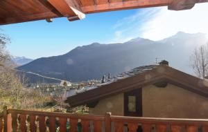 a house with a view of a mountain at Beautiful Apartment In Châtillon in Châtillon