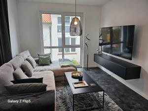 Zona d'estar a Neue hochwertige Wohnungen