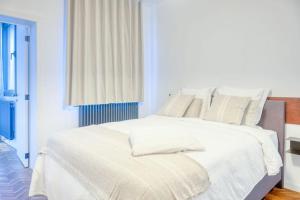 Een bed of bedden in een kamer bij 2-BR Haven in Antwerp