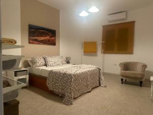 Villa Gairía tesisinde bir odada yatak veya yataklar