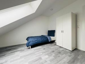 Postel nebo postele na pokoji v ubytování Apartment Weikersheim II