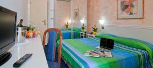 TV a/nebo společenská místnost v ubytování Hotel Sirius Riccione