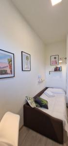 Una cama o camas en una habitación de PescaraHome Monolocale Essential