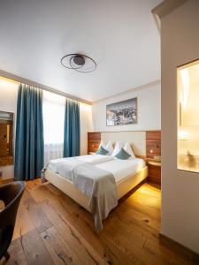 Postel nebo postele na pokoji v ubytování Design Hotel Frauenschuh
