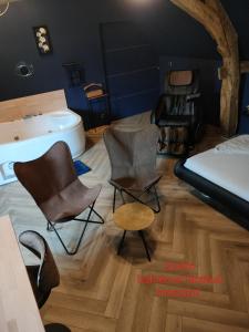 Postel nebo postele na pokoji v ubytování Calme et Volupté