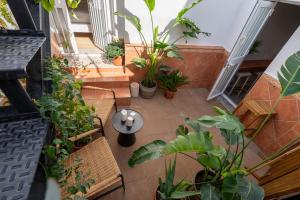 an overhead view of a balcony with plants at I AM Benalmádena in Benalmádena