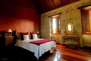 Ένα ή περισσότερα κρεβάτια σε δωμάτιο στο 3 bedrooms property with terrace and wifi at La Pena