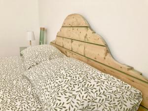 Katil atau katil-katil dalam bilik di Anita Bnb Rimini