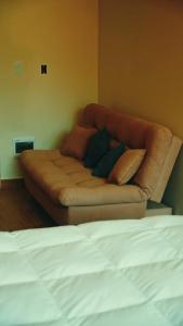 Area tempat duduk di Kawsay Apartament Lodge