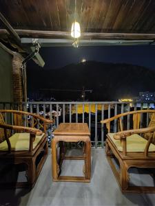 Balkón nebo terasa v ubytování Xinsu Courtyard View GuestHouse