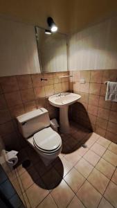 Koupelna v ubytování Hotel Meliana