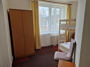 Katil atau katil-katil dalam bilik di Hotel Harrachov Inn