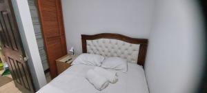 Un ou plusieurs lits dans un hébergement de l'établissement 7H Entire Condo Near Cariari Golf club and SJO