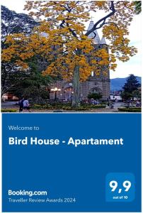 a picture of a bird house and a tree at Bird House - Apartament in Jardin