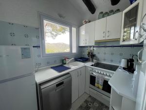 A kitchen or kitchenette at Villa Mediterraneo