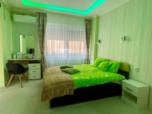 Postel nebo postele na pokoji v ubytování Belien Apartman