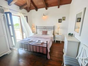 A bed or beds in a room at Villa Campanula