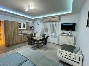 Kuchyň nebo kuchyňský kout v ubytování Belien Apartman