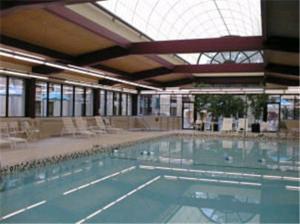 a large swimming pool in a large building at Decatur Conference Center and Hotel in Decatur