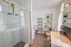 a bathroom with a shower and a toilet at HENRI CAMILLE REAL ESTATE - Florida - 2 bedrooms close center in Cannes