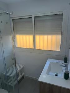 Kúpeľňa v ubytovaní Golden Hour Grupo AC Gestión