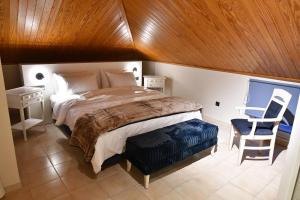 Postel nebo postele na pokoji v ubytování Porto Nafplio