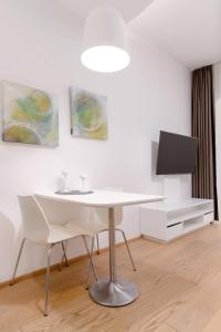 Telewizja i/lub zestaw kina domowego w obiekcie limehome Graz - Argos by Zaha Hadid