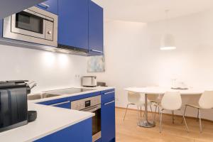 Kuchnia lub aneks kuchenny w obiekcie limehome Graz - Argos by Zaha Hadid
