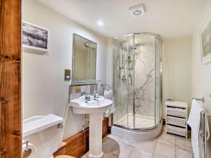 a bathroom with a shower and a sink at 6 Bed in Rye 93953 in Rye