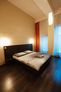 a bedroom with a large bed in a room at Apartmán na Hlavnej ulici in Košice