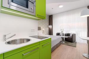 Kuchnia lub aneks kuchenny w obiekcie limehome Graz - Argos by Zaha Hadid