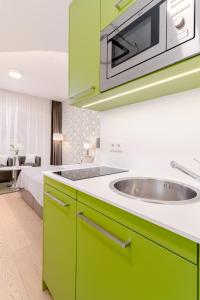 Kuchnia lub aneks kuchenny w obiekcie limehome Graz - Argos by Zaha Hadid
