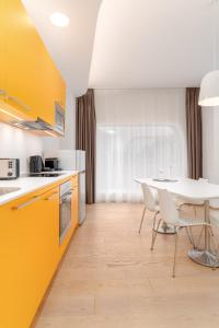 Kuchnia lub aneks kuchenny w obiekcie limehome Graz - Argos by Zaha Hadid