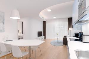 Kuchnia lub aneks kuchenny w obiekcie limehome Graz - Argos by Zaha Hadid