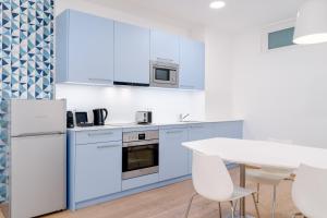 Kuchnia lub aneks kuchenny w obiekcie limehome Graz - Argos by Zaha Hadid
