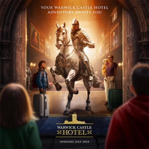 un póster de un hombre montando un caballo en un escenario en Warwick Castle Hotel & Knight's Village en Warwick