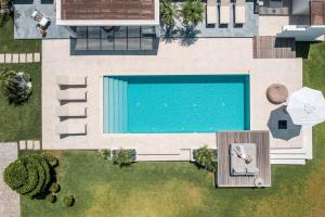 Bazén v ubytování Oneiro Villa - Voted the best Villa in Rhodes, Greece! nebo v jeho okolí