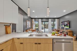 a kitchen with a sink and a counter top at Hyve - Southern Comfort - Walk to Broadway in Nashville