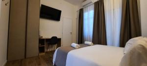 Voodi või voodid majutusasutuse R & A Minerva Suites toas