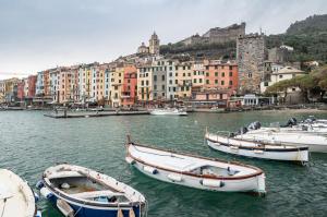 a group of boats in a body of water with buildings at GuestHost - Ca' Du Beppino Portovenere Central Suite in Portovenere