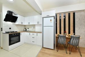 Η κουζίνα ή μικρή κουζίνα στο Somer Suite 3