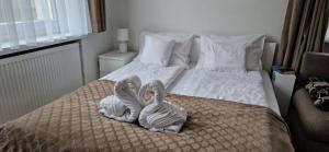 Łóżko lub łóżka w pokoju w obiekcie Apartament Rynek 40m2 Wrocław Stare Miasto