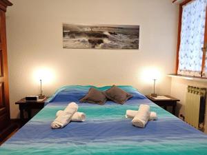 מיטה או מיטות בחדר ב-Hostdomus - Wood Apartment