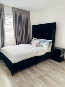Krevet ili kreveti u jedinici u objektu Quebella Luxury Home