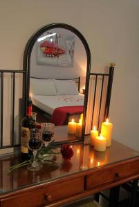 A bed or beds in a room at Ionia rooms